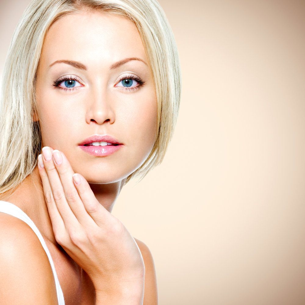 Portrait of a beautiful woman with healthy clean skin